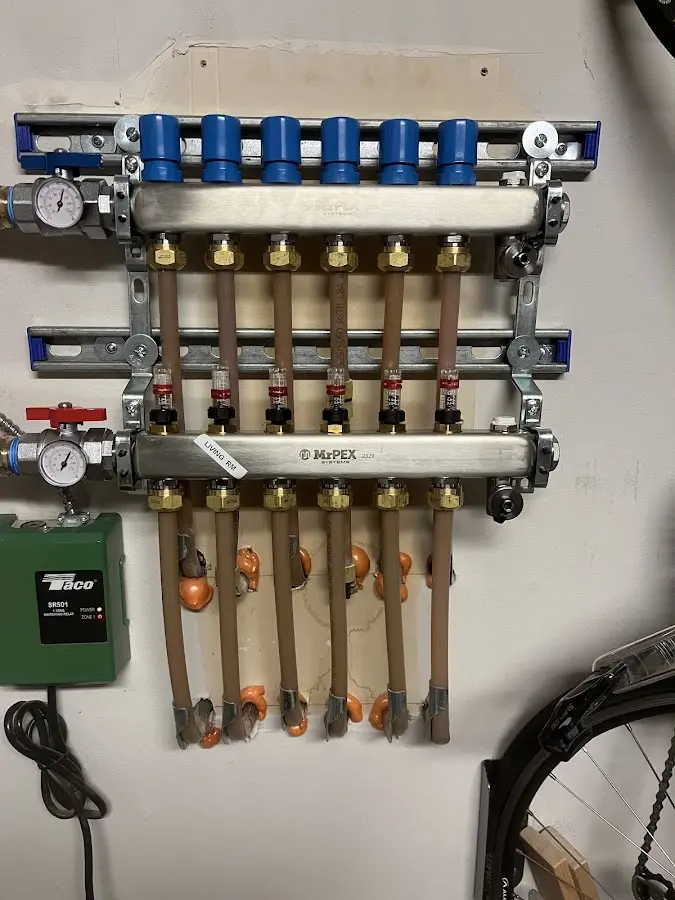 Plumber performing Water Heater Repair at a residential property in Whiteriver